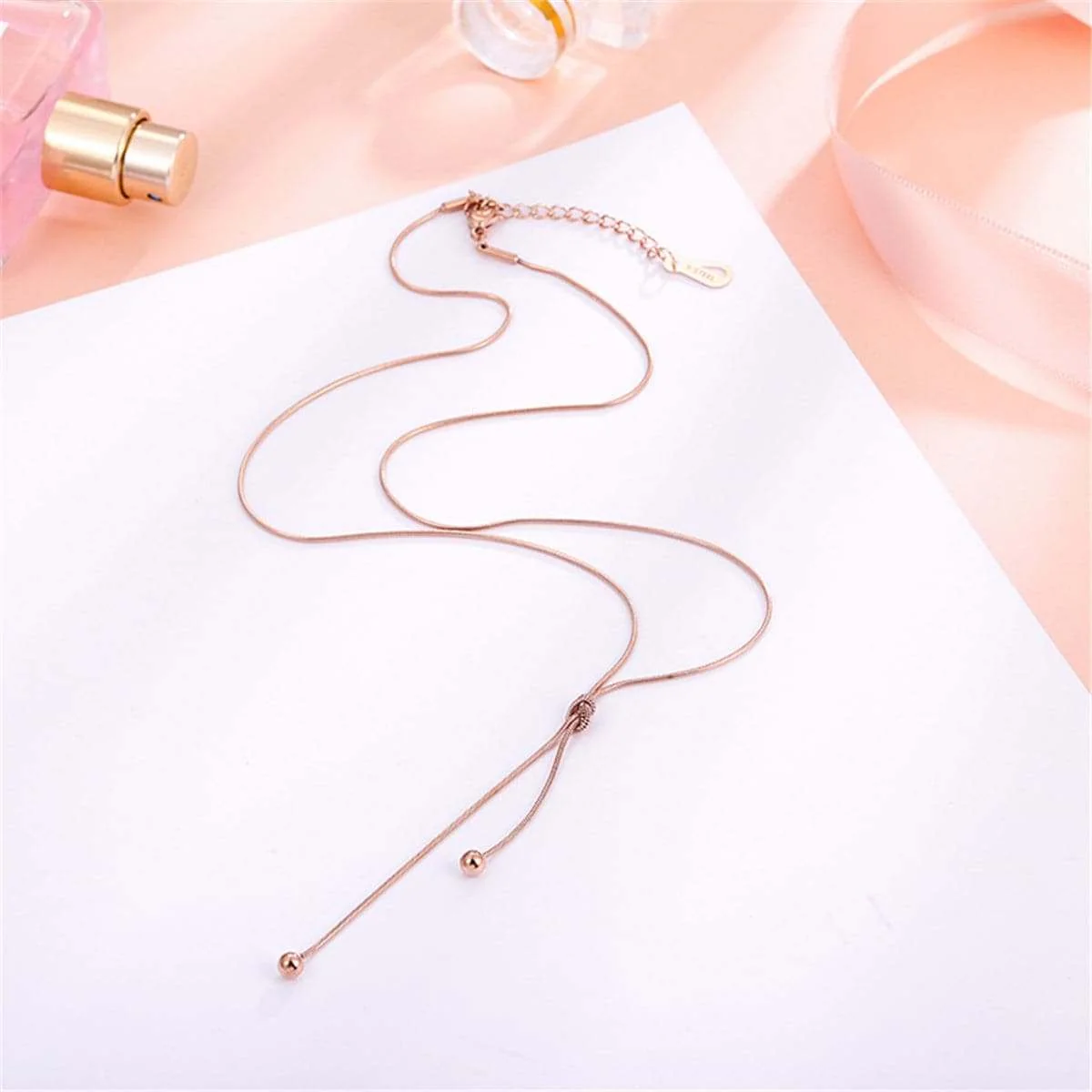 World-Class Rose Goldtone Knot Bead Lariat Necklace Superior