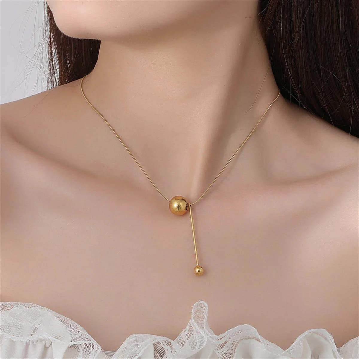 Versatile Goldtone Ball Drop Pendant Necklace Smooth