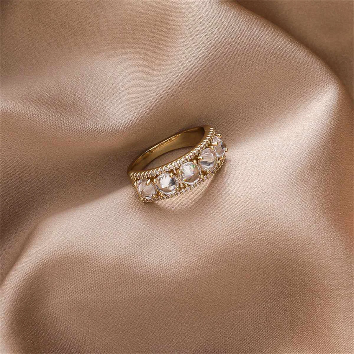 Artisan Cubic Zirconia Crystal Goldtone Round-Cut Channel Band Ring Effective