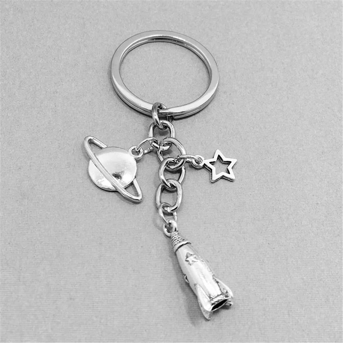 Efficient Silvertone Rocket Key Chain Healthy