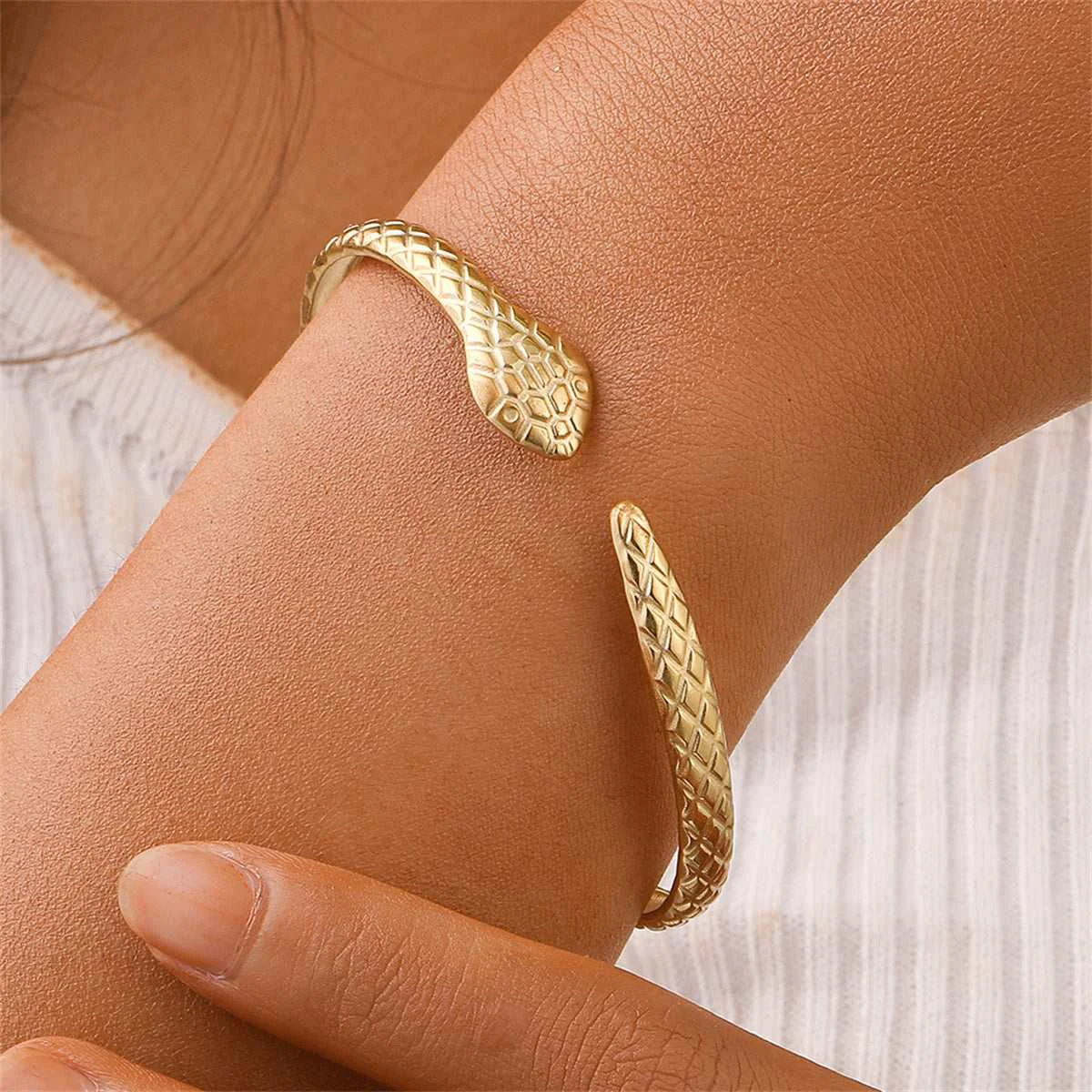 Refined Goldtone Snake Cuff Reliable
