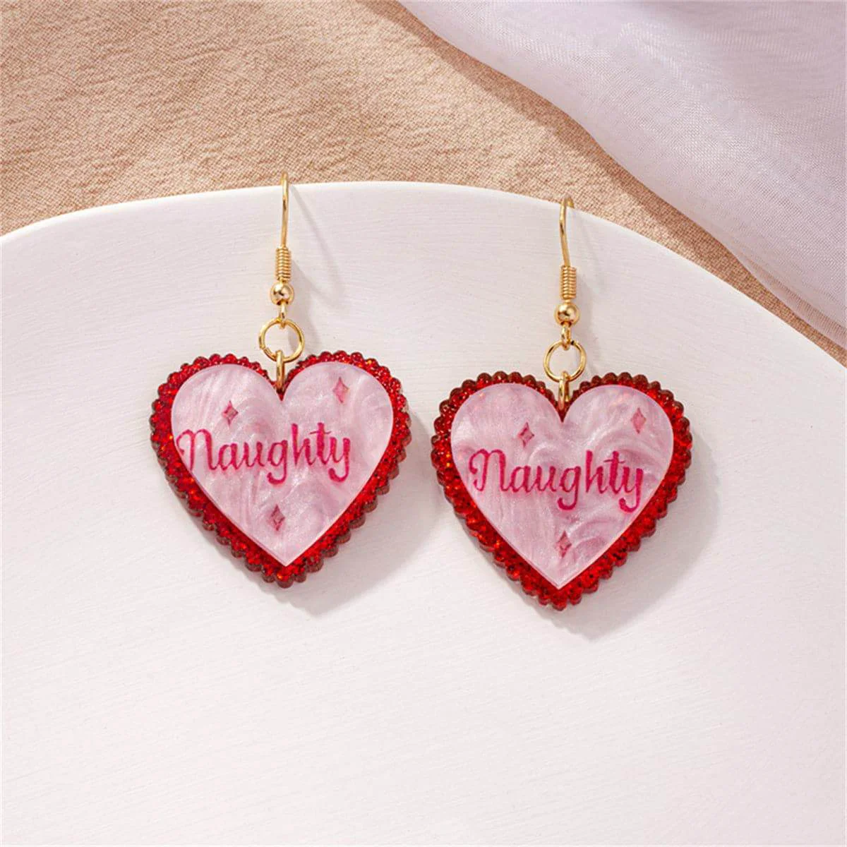 Verified Pink Shell Goldtone 'Naughty' Heart Drop Earring Original