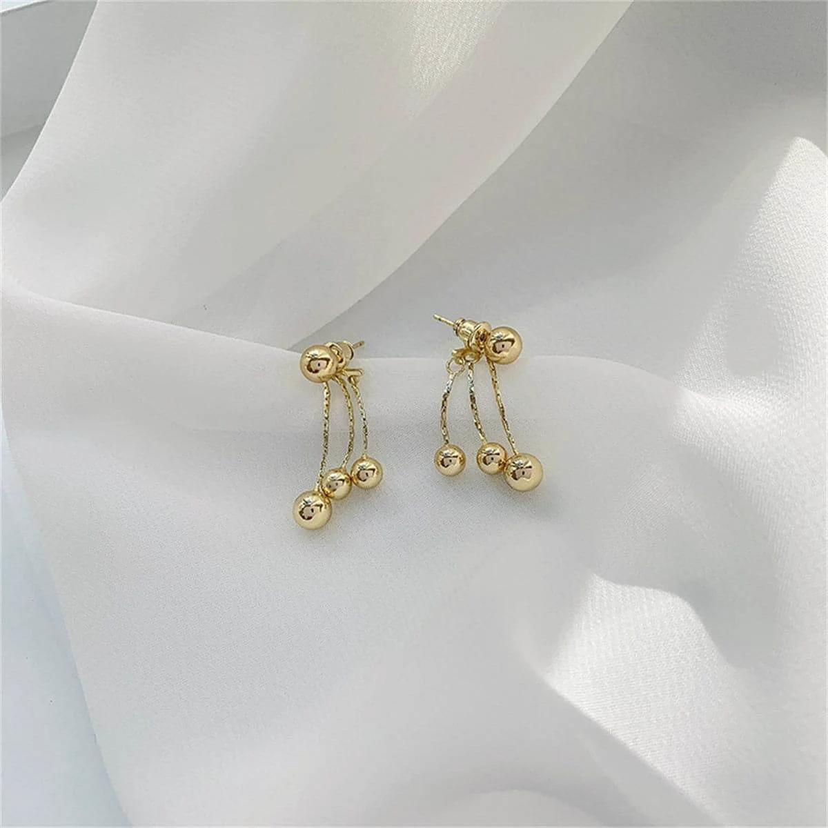 Environmentally Friendly Goldtone Waterfall Ball Tassel Ear Jackets Premium Material