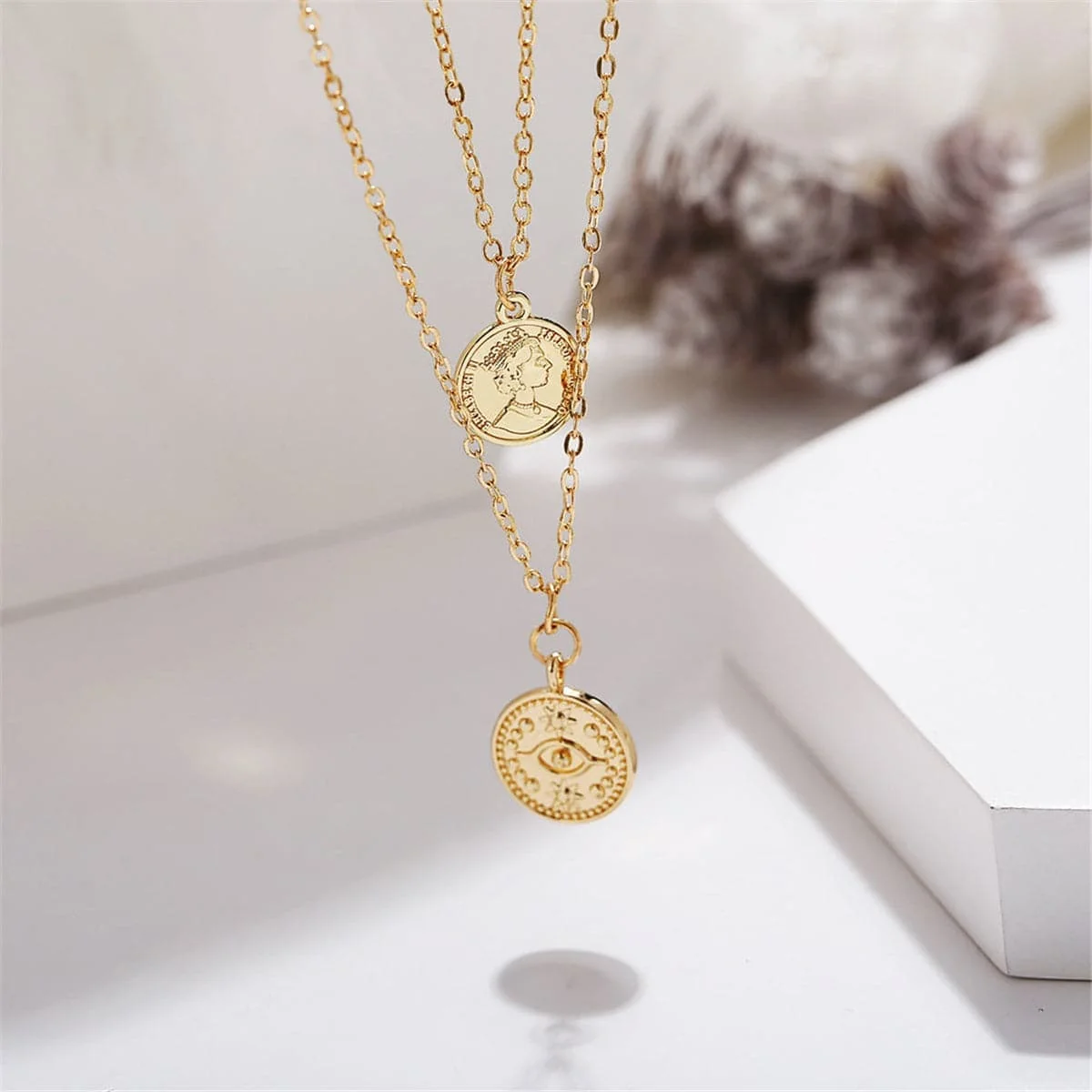 Advanced Goldtone Eye Coin Layered Pendant Necklace Premium